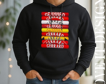 May include: Black hooded sweatshirt with a graphic design featuring the name "GERRARD" in red and white, stacked on top of each other. The design is on the front of the sweatshirt. The text "LOVE IT DESIGNS" is printed vertically on the right side.