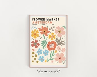 May include: A printable poster with the text "FLOWER MARKET AMSTERDAM" in black text on a cream background. The poster features a colorful illustration of various flowers in shades of pink, orange, yellow, blue, and green.