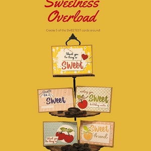 May include: Five handmade greeting cards featuring a cherry and peach design. The cards are presented on a tiered stand with black stones. The cards include the phrases "Sweet", "Sweet Friend", "Thank you for being so Sweet", and "Wishing you Sweet Birthday Wishes".