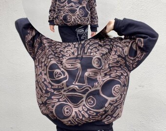Faces and 8 ball pattern hoodie