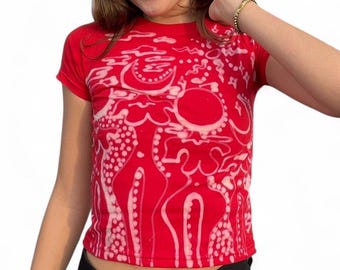 Celestial sun/moon head bodies tee