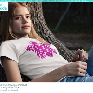 May include: A white t-shirt featuring a pink outline of a sea turtle. The t-shirt is being worn by a person lying on their back against a tree trunk. The text "This is an official Pixel Parade App® product. This purchase is a digital file ONLY. NO tangible items will be shipped." is at the bottom of the image.