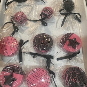 Hot pink and black chocolate covered Oreo and cake pops