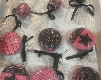 Hot pink and black chocolate covered Oreo and cake pops