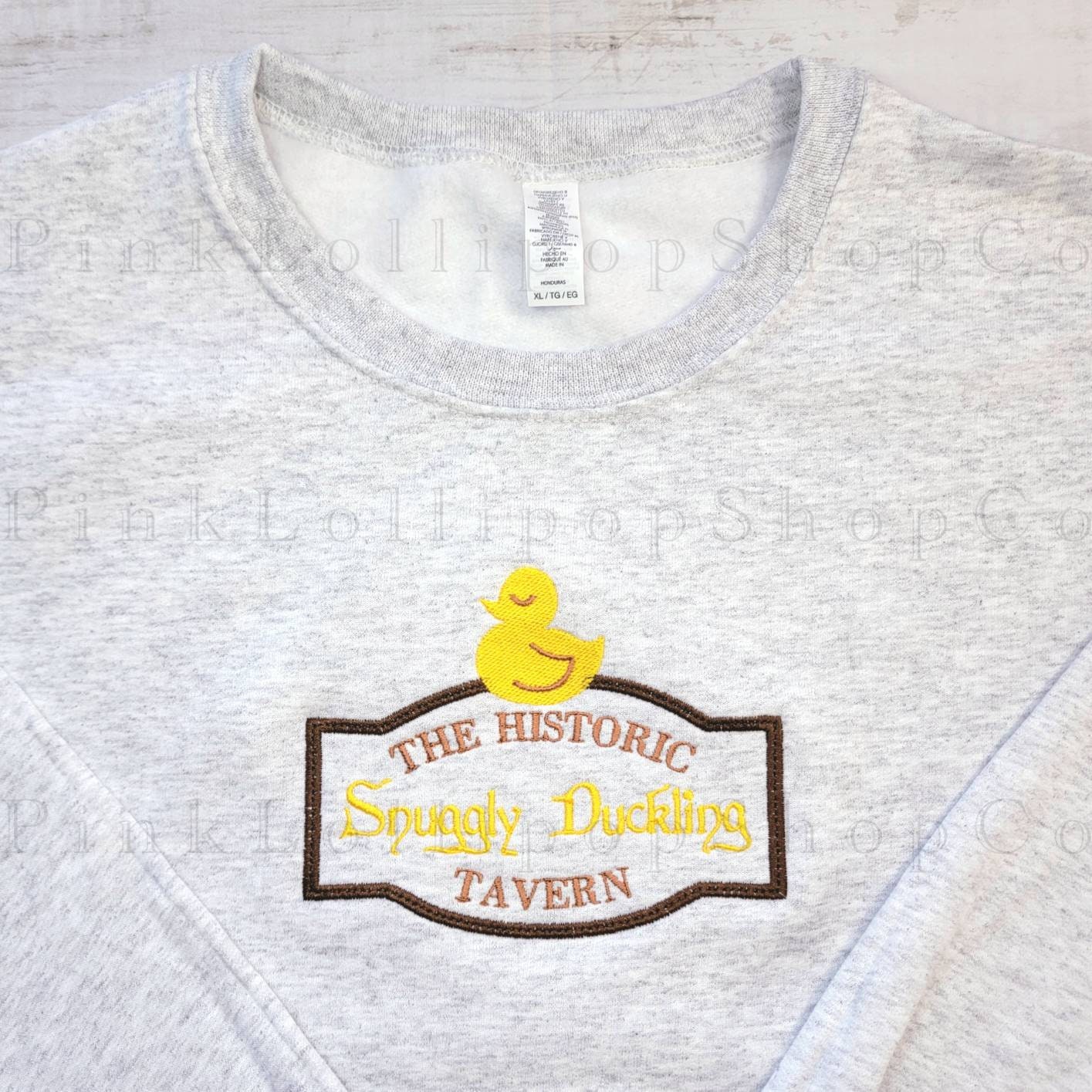 Snuggly Duckling Sweatshirt, Rapunzel Embroidered Crewneck