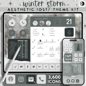 Op de afbeelding: Een digitale illustratie van een iOS 17-themaset met een winterstormthema. De set bevat een verscheidenheid aan pictogrammen, widgets en achtergronden. De pictogrammen zijn in een grijs en wit kleurenschema en bevatten winterse ontwerpen, zoals sneeuwvlokken, bomen en sneeuwpoppen. De widgets omvatten een kalender, een takenlijst en een weerwidget. De achtergronden zijn een verscheidenheid aan winterse scènes, zoals een besneeuwd bos en een winters stadsbeeld. De set bevat ook een verscheidenheid aan lettertypen en kleuren om het uiterlijk van uw apparaat aan te passen.