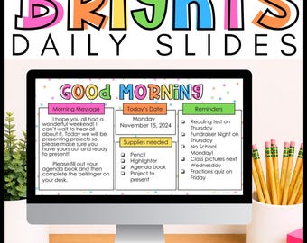 May include: A computer monitor displaying a colourful daily slide template with the text BRIGHTS DAILY SLIDES and GOOD MORNING. The screen shows sections for a morning message, date, supplies needed, and reminders, set against a white background.