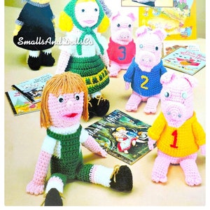 Può includere: Bambole e burattini all'uncinetto ispirati a classici racconti per bambini, tra cui Cappuccetto Rosso, I Tre Porcellini e Hansel e Gretel. Le bambole sono realizzate con filati di vari colori, tra cui rosa, verde, giallo e blu. I burattini sono realizzati con filati grigi e neri.