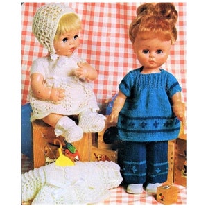 May include: Two knitted doll outfits. One outfit is white with a crocheted hat and the other is blue with a white trim and a matching pair of trousers.