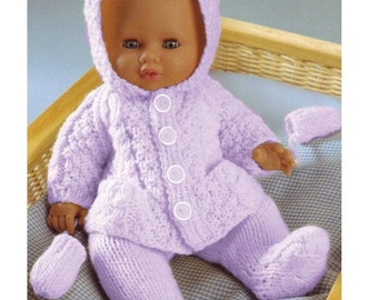 May include: A doll wearing a light purple knitted outfit, including a hooded jacket with three white buttons, pants, and booties. The doll is seated in a wicker basket. The text "SmallsandDolls" is visible.