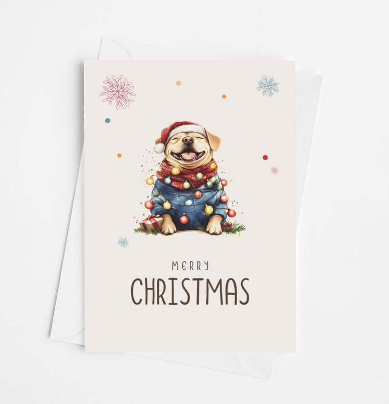 May include: A Christmas card featuring a cartoon illustration of a dog wearing a Santa hat and a blue jacket with Christmas lights wrapped around it. The dog is smiling and the text "Merry Christmas" is printed below the dog.