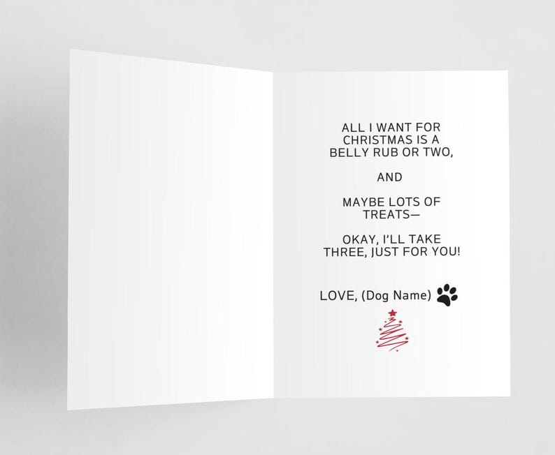 May include: A Christmas card with a black paw print and a red Christmas tree illustration. The text reads: "All I want for Christmas is a belly rub or two, and maybe lots of treats - okay, I'll take three, just for you! Love, (Dog Name)"