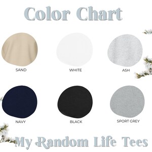 May include: Color chart featuring six fabric color swatches: sand, white, ash, navy, black, and sport grey. The text "Color Chart" is at the top, with "My Random Life Tees" at the bottom. Floral accents frame the image.