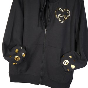 Black Zip up hoodie, metallic gold rose, ladybugs, heart frog, wings and star design.