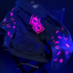 Pink fluorescent lips with Capital H hoodie