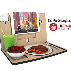 May include: Kids iPad Docking Station made of wood with a tray for snacks and drinks. The station has a built-in stand for an iPad and a charging port. The station is designed for children and is perfect for watching movies or playing games. CNC Laser Cutting Files. Thickness: 4-5-6-8 mm.