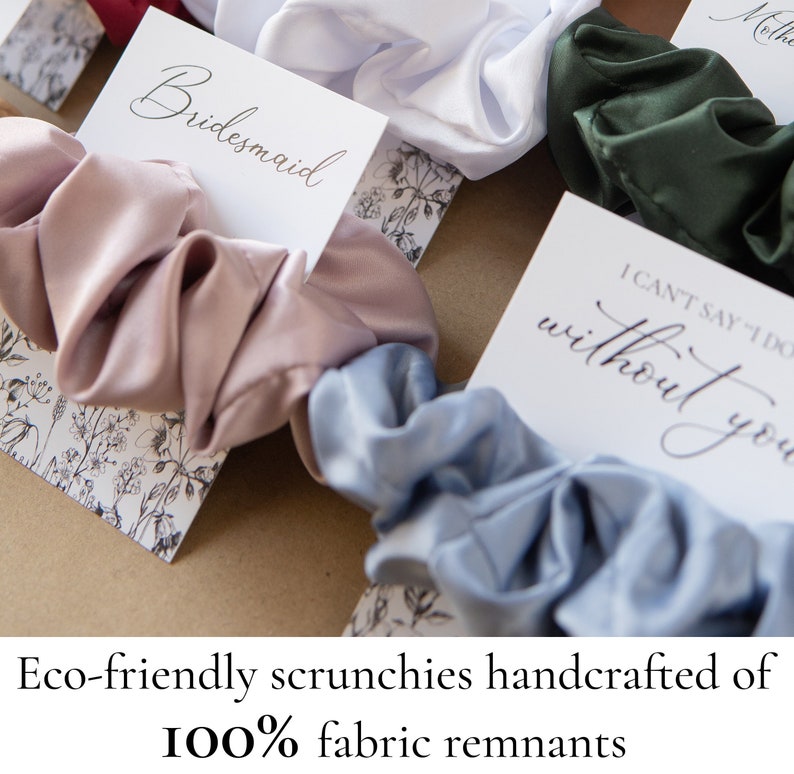 May include: A set of colorful satin scrunchies with cards that say "Bridesmaid" and "I can't say 'I do' without you". Eco-friendly scrunchies handcrafted of 100% fabric remnants.