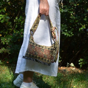 Cross body bag handbag handmade. Mini crossbody bag. Fabric shoulder bag and in hand.