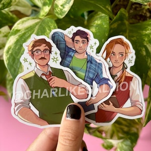 May include: Three character stickers featuring illustrations of people in various outfits. One sticker shows a person with glasses and a mustache, wearing a green vest and a red tie. The other two stickers show people in casual attire. The stickers have a white border.
