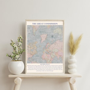 May include: A printable wall art print with a vintage world map and the text "The Great Commission" and a bible verse from Matthew 28:18-20. The map is in shades of pink, blue, and green.