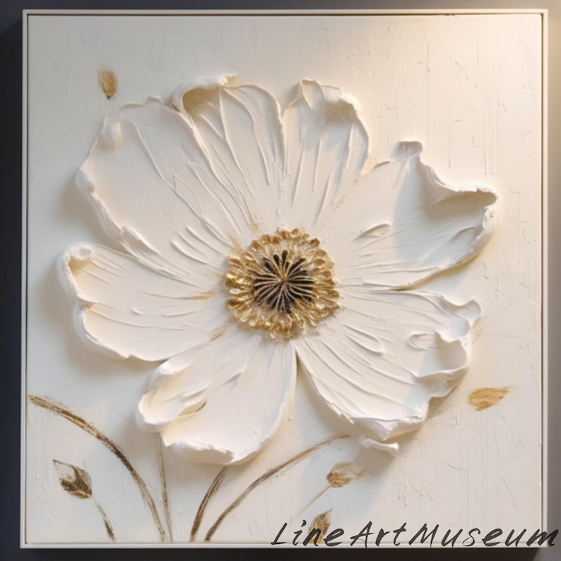 May include: A white, textured, 3D floral artwork in a square frame. The flower has large, textured petals and a gold-colored center. The artwork includes gold accents and the text "Line Art Museum" in the bottom right corner.