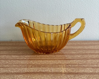 Juskom van amberkleurig glas met bijenkorfdesign uit de jaren 1950