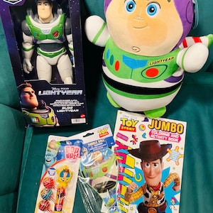 May include: A collection of Toy Story merchandise, including a Buzz Lightyear action figure in a box, a plush Buzz Lightyear, a coloring book, and various small toys. The items are in bright colors, with the Buzz Lightyear figure and plush prominently displayed.