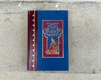 Libro de tapa dura "Cuentos de las mil y una noches" con ilustraciones.