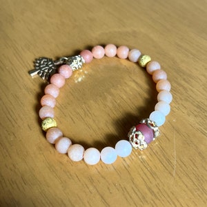 Natural orange Aventurine and Carnelian beads elasticated bracelet with a stainless steel Tree of life charm. Gemstone bracelet.Gift for her