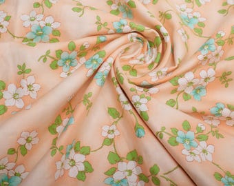 Tela de algodón sarga cepillada con estampado floral, textil vintage de los años 70 con estampado floral color melocotón para confección de vestidos.