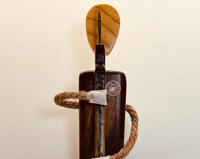 Marine soldier hand made faceless wood figurine.