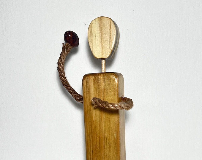 Football player hand made wood figurine. Faceless