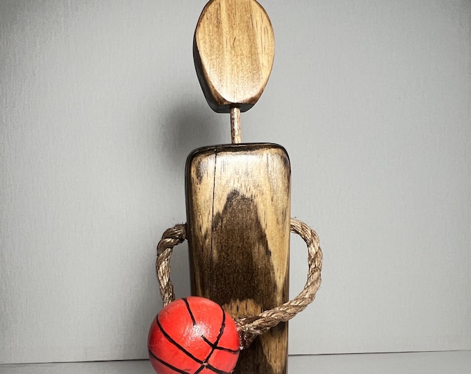 Basketball player hand carved wood figurine