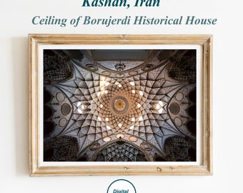 May include: A close-up view of the ornate ceiling of the Borujerdi Historical House in Kashan, Iran. The ceiling is made of intricate geometric patterns and is decorated with small, round lights.