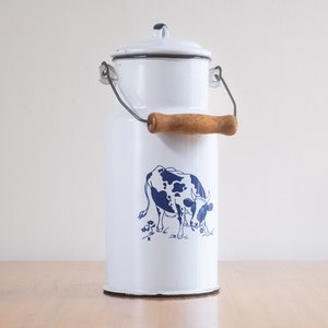 Vintage enamel milk pitcher, Cow illustration on vintage pitcher, white and blue enamel pitcher