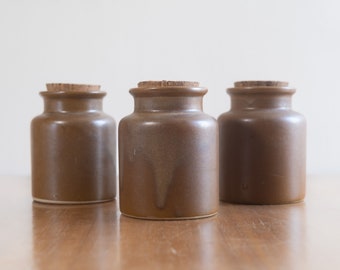 Vintage set of three glazed stoneware jars with cork stopper