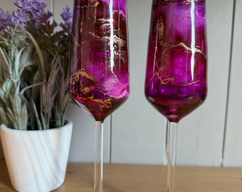 Pair of pink and gold Prosecco glasses