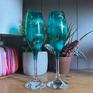 Single or pair of hand decorated turquoise and gold prosecco flutes glasses. Ready to dispatch