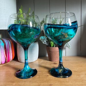 Single glass or pair of beautiful hand decorated blue turquoise and silver or gold gin glasses