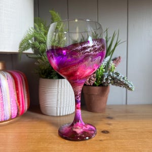 Single glass or pair of beautiful hand decorated pink purple white and gold or silver gin glasses