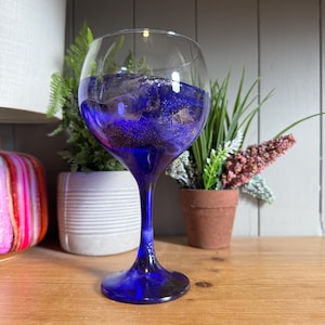 Single glass or pair of beautiful hand decorated bright violet purple and silver or gold glitter gin glasses