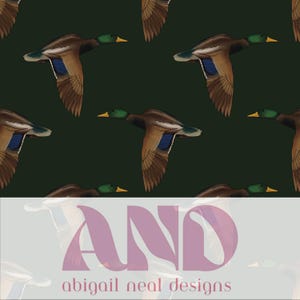 May include: A repeating pattern of flying ducks against a dark green background. The ducks have brown and blue wings, green heads, and yellow beaks. The text "AND" in a mauve color is at the bottom, with "abigail neal designs" below it.