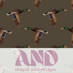 May include: A repeating pattern of flying ducks on a brown background. The ducks have brown and white wings, blue accents, and green heads. The text "AND" and "abigail neal designs" are in the lower portion of the image.