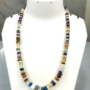 mix multi stone rondelle shape with metal lock strand 5mm to 13mm one line strand 20 inch ,weight 260ct one line weight smooth necklace