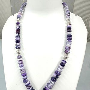 tiffany opal faceted rondelle with metal lock  strand 6mm to 10mm one line strand 20 inch ,weight 260ct one line weight Faceted - necklace