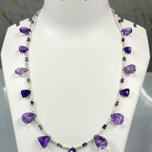 Amethyst extravagant geschliffen und getrommelt mit metal lock strang 3 mm bis 18 mm, one line strang 20 inch , Gewicht 80ct one line facettiert