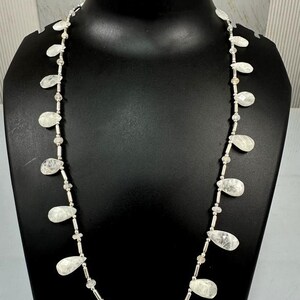 Rainbow moonstone faceted pear and rondelle with metal lock strand 12mm to 15mm one line strand 20inch ,weight 110ct one line cut necklace