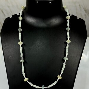 Aquamarine rondelle shape with metal lock strand 4mm to 9mm one line strand 20 inch weight 80ct one line weight Faceted