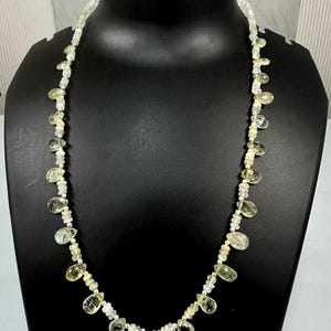 Aquamarine faceted rondelle and pear mix quartz with metal lock strand 4x5mm to 7x13mm one line strand 20 inch ,weight 100ct one line weight