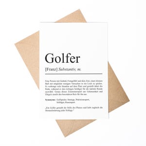 Könnte beinhalten: Eine weiße Karte mit dem deutschen Wort "Golfer" in fetter, schwarzer Schrift. Die Karte liegt auf einem braunen Umschlag. Die Karte enthält eine Definition des Wortes "Golfer" auf Deutsch.